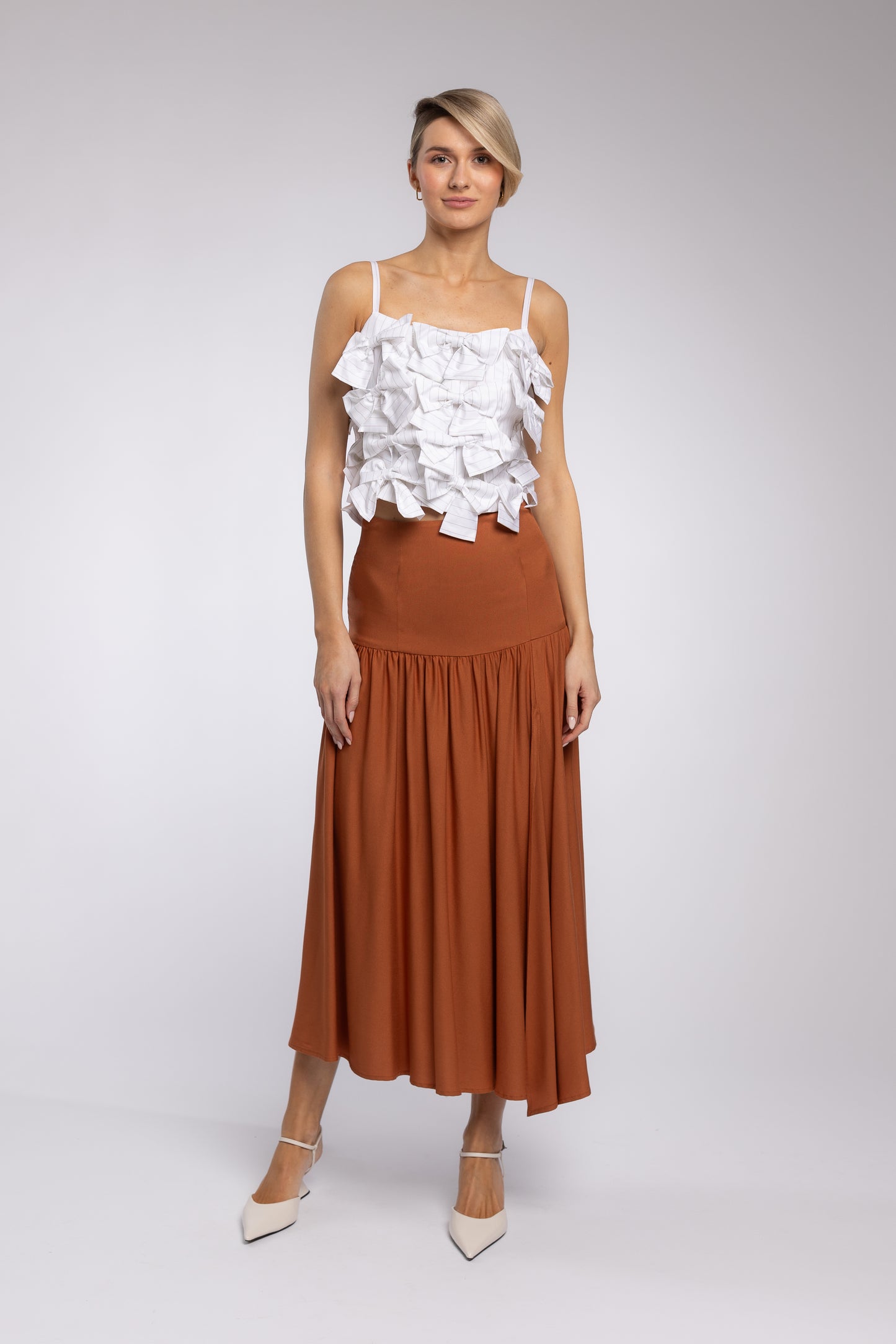 
                  
                    TIGER EYE SKIRT
                  
                