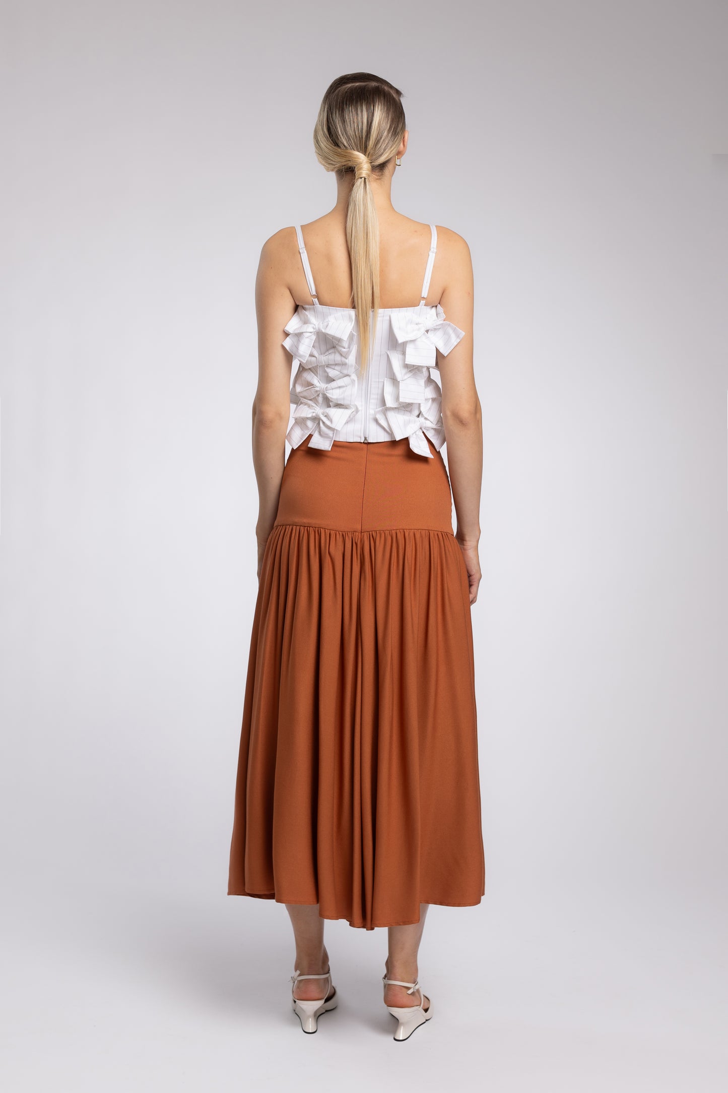 
                  
                    TIGER EYE SKIRT
                  
                