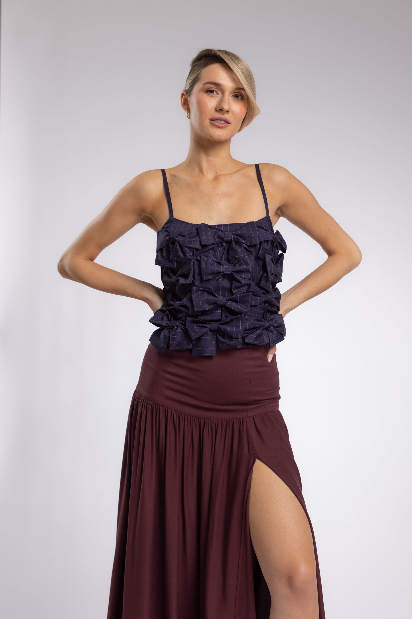 
                  
                    GARNET SKIRT
                  
                