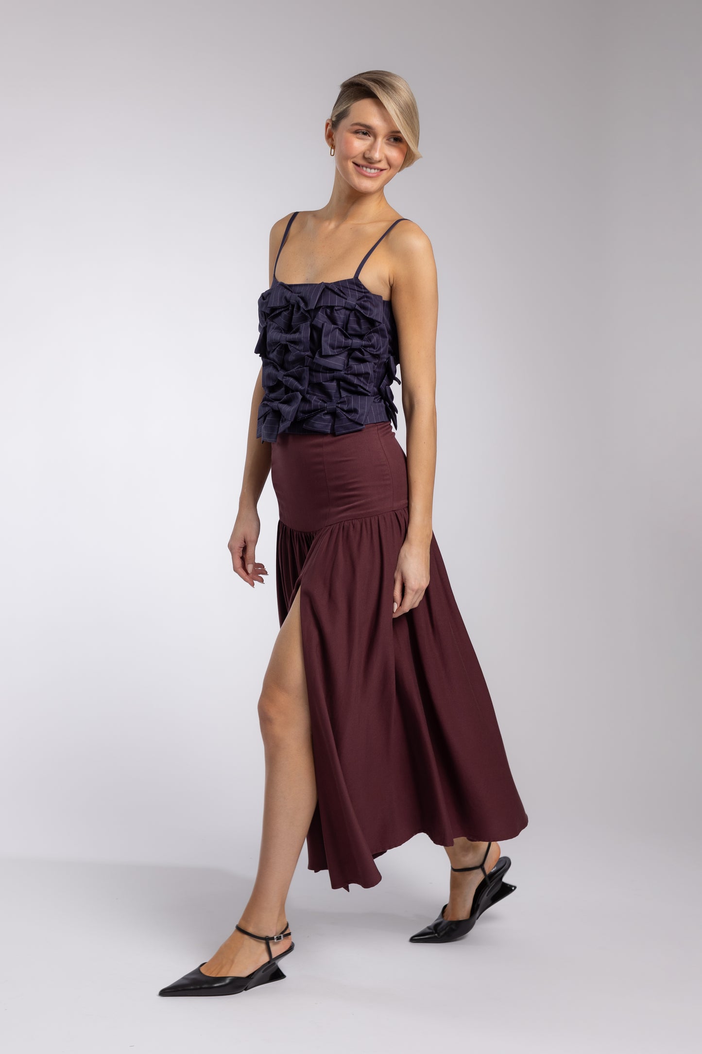 
                  
                    GARNET SKIRT
                  
                