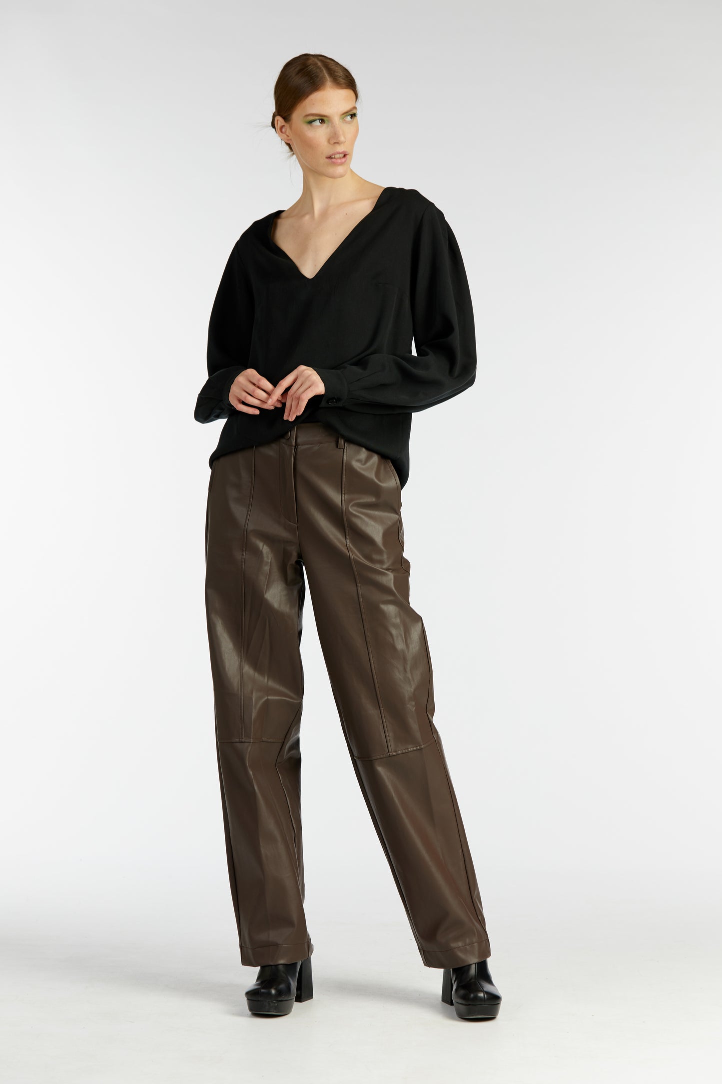 
                  
                    BLACK CHARM top
                  
                